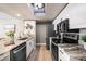 Well-equipped kitchen featuring stainless steel appliances and granite countertops at 5005 Laguna Bay Cir # 17, Kissimmee, FL 34746