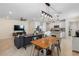 Bright, open living space combining the kitchen, dining, and living areas, perfect for entertaining at 5298 Royal Point Ave, Kissimmee, FL 34746