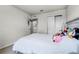 Bedroom featuring a window, carpet, neutral walls and closet with sliding doors at 5329 Royal Point Ave, Kissimmee, FL 34746