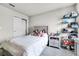 Bedroom featuring a window, carpet, neutral walls and storage shelving unit at 5329 Royal Point Ave, Kissimmee, FL 34746