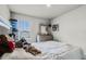 Bedroom featuring a window, neutral walls, carpet and dresser with mirror at 5329 Royal Point Ave, Kissimmee, FL 34746