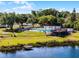 Aerial view of community pool area and lush surroundings at 5402 Kingswood Dr, Orlando, FL 32810