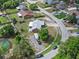Scenic aerial shot of homes near a lake surrounded by lush trees, showcasing the beautiful community layout at 549 Mcneal Dr, Deltona, FL 32725