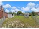 A lawn area with two small sheds at 549 Mcneal Dr, Deltona, FL 32725