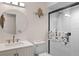 Modern bathroom with a glass-enclosed shower, sleek vanity, and stylish fixtures for a spa-like experience at 549 Mcneal Dr, Deltona, FL 32725