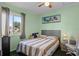 Bright bedroom with a ceiling fan and large window offers a comfortable and inviting space with ample natural light at 549 Mcneal Dr, Deltona, FL 32725