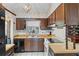 Bright kitchen featuring sleek countertops, modern appliances, and natural light at 549 Mcneal Dr, Deltona, FL 32725