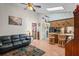 Open-concept living area featuring unique décor, wood floors and lots of light at 549 Mcneal Dr, Deltona, FL 32725