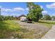 Image of RV with pickup truck in the lawn parking area at 549 Mcneal Dr, Deltona, FL 32725