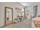 Bedroom with a large mirror, desk and guitar at 58 Zamora Pl, Oviedo, FL 32765