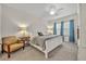 This bedroom has a ceiling fan and plenty of natural light at 58 Zamora Pl, Oviedo, FL 32765