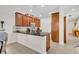 Well-equipped kitchen with granite countertops and cherry wood cabinetry at 58 Zamora Pl, Oviedo, FL 32765