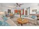 Open-concept living area with dining space and comfortable furnishings at 58 Zamora Pl, Oviedo, FL 32765