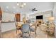 Open-concept layout showcasing dining area and comfortable living space at 58 Zamora Pl, Oviedo, FL 32765