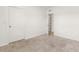 This bedroom features neutral walls and beige carpeting at 715 Chinoy Rd, Davenport, FL 33837
