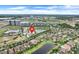 Discover this community from above, marked with a pin for its prime location near waterways and city amenities at 7772 Sweet Star Avenue, Orlando, FL 32836