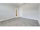 This bedroom is equipped with carpet, recessed lighting, and a nearby closet at 7772 Sweet Star Avenue, Orlando, FL 32836