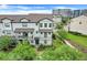 Charming townhome with balconies, and manicured landscaping, perfect for enjoying the beautiful outdoors at 7772 Sweet Star Avenue, Orlando, FL 32836