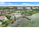Enjoy resort-style living with a luxurious pool, clubhouse, and scenic waterfront views in this vibrant community at 7772 Sweet Star Avenue, Orlando, FL 32836