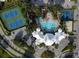 Aerial shot of community amenities including a pool, tennis courts, clubhouse, and basketball court at 8023 King Palm Cir, Kissimmee, FL 34747