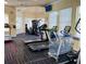 Bright fitness center with treadmills, elliptical machines, and weight equipment at 8023 King Palm Cir, Kissimmee, FL 34747