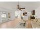 Open-concept living space includes a Gathering room, dining area, and a kitchen with a breakfast bar for casual dining at 836 Copperfield Ter, Casselberry, FL 32707