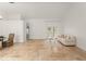 Bright living room featuring beautiful tile floors and a sliding glass door at 836 Copperfield Ter, Casselberry, FL 32707