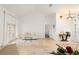 Bright living room featuring travertine floors and views to the entry and back patio at 836 Copperfield Ter, Casselberry, FL 32707