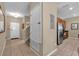 Foyer with ceramic tile floors, stairs and a closet with storage at 8972 Coco Palm Rd, Kissimmee, FL 34747