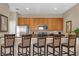 Eat-in kitchen featuring a breakfast bar with seating and stainless steel appliances at 8972 Coco Palm Rd, Kissimmee, FL 34747