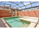 Refreshing private pool with a screened enclosure, offering a relaxing outdoor oasis at 8972 Coco Palm Rd, Kissimmee, FL 34747