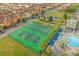 Aerial view of basketball and tennis courts, conveniently located near the community pool and clubhouse at 8972 Coco Palm Rd, Kissimmee, FL 34747