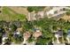 Aerial view showcases the property, mature trees, and sparkling pool at 913 Red Fox Rd, Altamonte Springs, FL 32714