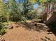 A spacious backyard featuring lots of shade with trees and greenery at 913 Red Fox Rd, Altamonte Springs, FL 32714