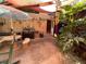 The backyard boasts a charming patio, perfect for outdoor relaxation and entertaining with colorful decor at 913 Red Fox Rd, Altamonte Springs, FL 32714