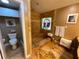 Modern bathroom features gorgeous marble floors, a unique stained-glass window, and a spacious walk-in shower at 913 Red Fox Rd, Altamonte Springs, FL 32714