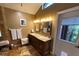 Bathroom featuring double sink vanity, granite countertops, and a doorway to the shower at 913 Red Fox Rd, Altamonte Springs, FL 32714
