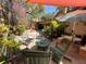 Lush courtyard offers ample seating with a shady canvas awning for a relaxing outdoor experience at 913 Red Fox Rd, Altamonte Springs, FL 32714