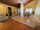 Dining area with travertine floors, stylish chandelier, and access to multiple rooms at 913 Red Fox Rd, Altamonte Springs, FL 32714