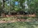 A brick sign wall for Apple Valley North, framed by mature trees and lush landscaping, enhancing the community's charm at 913 Red Fox Rd, Altamonte Springs, FL 32714