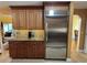 Modern kitchen with stainless steel appliances, custom cabinets, and a stylish backsplash for a chef's delight at 913 Red Fox Rd, Altamonte Springs, FL 32714