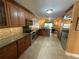 Spacious kitchen with stainless steel appliances and a view into the dining area at 913 Red Fox Rd, Altamonte Springs, FL 32714