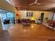 Bright living room with hardwood floors, stylish decor, and sliding glass doors to the outdoor patio at 913 Red Fox Rd, Altamonte Springs, FL 32714