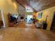 Spacious living area with a cozy fireplace, hardwood floors, and vaulted ceiling at 913 Red Fox Rd, Altamonte Springs, FL 32714