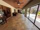 Beautiful lanai with travertine tile, ceiling fans, and great views of the backyard at 913 Red Fox Rd, Altamonte Springs, FL 32714