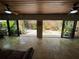 Bright sunroom with large sliding glass doors opening to the private, landscaped outdoor space at 913 Red Fox Rd, Altamonte Springs, FL 32714