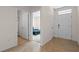 Welcoming entryway with a tiled floor, offering views into the bedroom and bathroom at 1059 Cypress Fox Blvd, Davenport, FL 33897