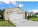 Charming single-Gathering home with a well-maintained lawn and a two-car garage, perfect for comfortable living at 1059 Cypress Fox Blvd, Davenport, FL 33897