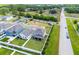 Aerial view of a home and surrounding neighborhood with a playground at 1118 Franklin Tree Ln, Sanford, FL 32771
