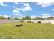 Spacious backyard enclosed by a white fence, perfect for outdoor activities at 1118 Franklin Tree Ln, Sanford, FL 32771